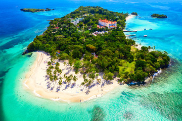 Aerial drone view of beautiful caribbean tropical island Cayo Levantado beach with palms. Bacardi Island, Dominican Republic. Vacation background. - obrazy, fototapety, plakaty