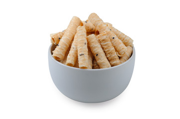 Thai crispy coconut rol in white porcelain bowll isolated on white background