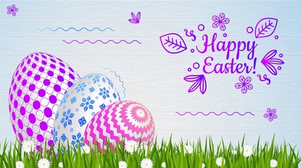 Easter greeting card template. Easter eggs on green grass with daisies.