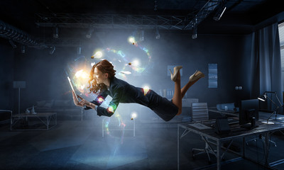 Joyful beautiful young levitating businesswoman. Mixed media