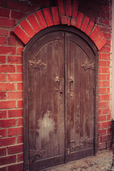 old virgin door and brick wall