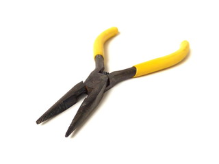 Close up of electrical pliers isolated on white background. Yellow handle pliers. Hand tool.