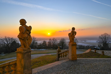Angels and sunset. Castle stairs and statues of Angels 