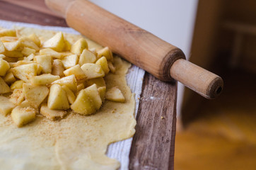 Homemade apple strudel with fresh apples. Cooking apple strudel