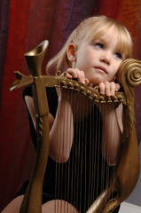  Girl and harp musical instrument..