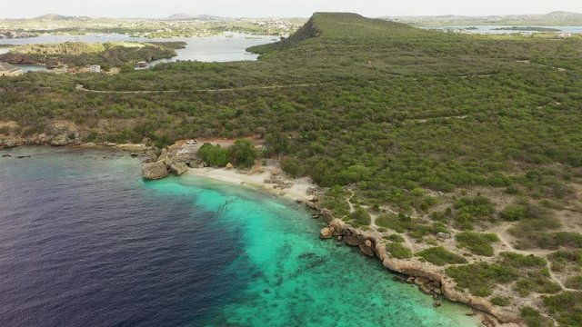 Aerial view around Director's bay - Curaçao - Caribbean Sea with former Quarantine house,  turquoise water, cliff, beach and beautiful coral reef