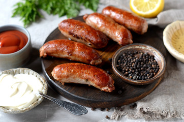 Homemade turkey (chicken) sausages with different sauces