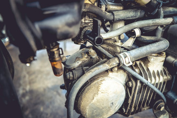 Fototapeta na wymiar Oil leak in the carburetor on a motorcycle engine