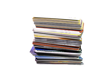 Stack of credit cards against white background