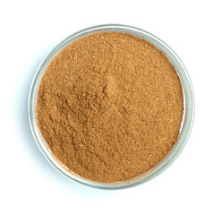 Powdered cinnamon in bowl