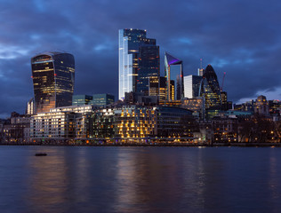 Fototapeta na wymiar A night view of the City of London over the Thames