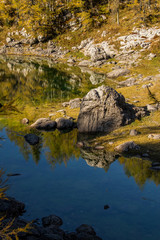 Naklejka na ściany i meble The Double Lake with larch trees at Valley of the Triglav Lakes