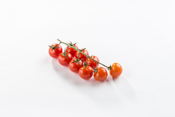 Ripe Fresh Cherry Tomatoes on Branch Isolated on White Background with shadow