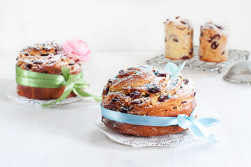 Easter cakes confectionery decorated with decorations and satin ribbons. two small cakes are ready...