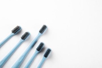 Fototapeta premium Toothbrushes on a white background. Health, hygiene, dentist and training concept