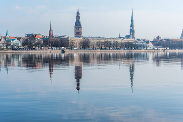 Cityscape of Riga Latvia with Reflections on a Quiet Still River