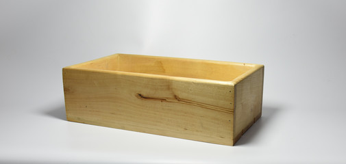 Handmade wooden box on gray background