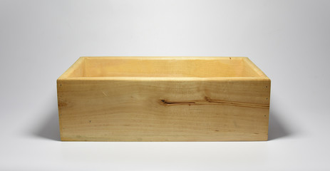 Handmade wooden box on gray background