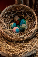 Colorful beautiful easter eggs in nest. Easter concept