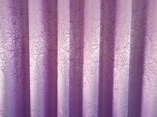 Purple curtain on the wall