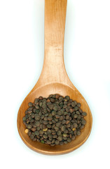 Lentil in wooden spoon