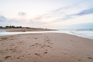 Sunset on the beach in Mediterranean Sea, Oliva, Valencia