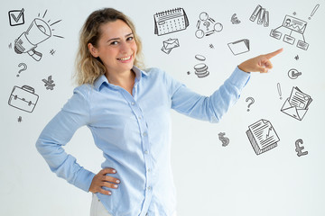 Office employee presenting with hand drawn business sketches. Cheerful woman presenting news....