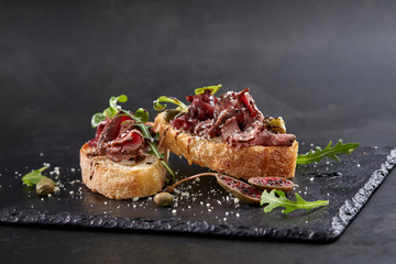 canape with meat  and vegetables