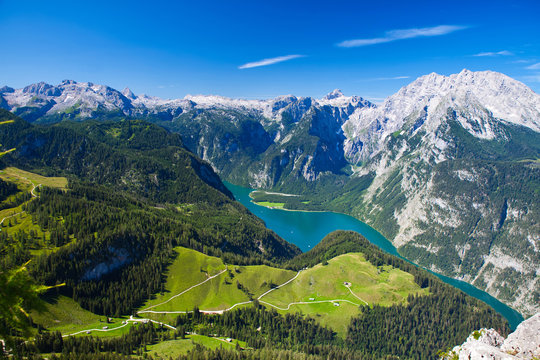view on lake K&ouml;nigssee and alps with hiking trails