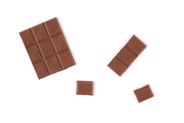 pieces of dark milk chocolate bar isolated on white background.