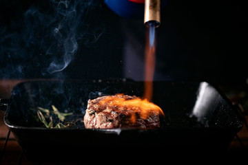 The process of grilling beef tenderloin in a pan, filet Mignon steak medium rare