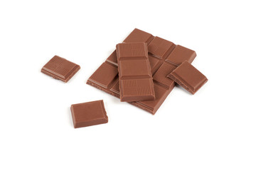 pieces of dark milk chocolate bar isolated on white background.