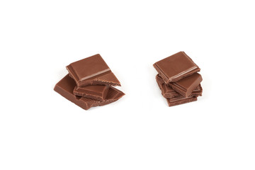pieces of dark milk chocolate bar isolated on white background.