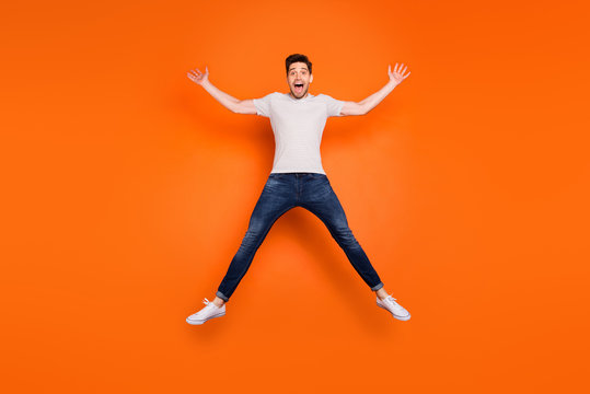 Full Body Photo Of Funky Pretty Lady Jumping High Up Celebrating Weekend  Vacation Start Wear Casual Green Shirt Yellow Pants Sneakers Isolated Blue  Color Background Stock Photo - Download Image Now - iStock