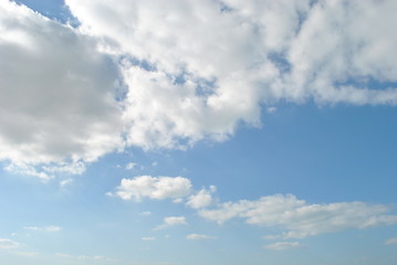 Naklejka na ściany i meble Cloudy nice sky at midday with sun bright