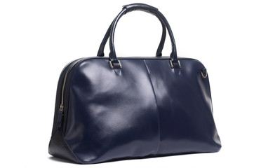 stylish female leather bag on a handle isolated on a white background