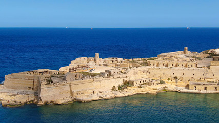 Fototapeta na wymiar Famous Fort Rikasoli in Kalkara Malta from above - aerial photography