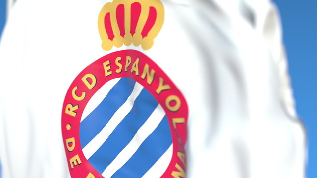 Waving flag with RCD Espanyol football club logo, close-up. Editorial 3D rendering