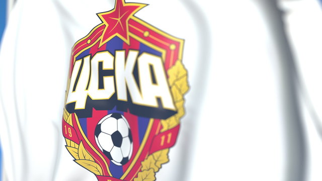 Flying flag with CSKA Moskva football club logo, close-up. Editorial 3D rendering