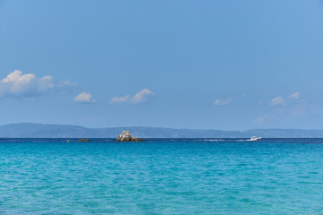 Beautiful sea view with clouds over the mountains