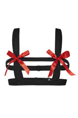 Subject shot of a black harness made of textile straps with silk red bows. The harness is isolated on the white background.  