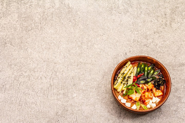 Traditional Korean spicy soup with kimchi, tofu, vegetables. Hot dish for healthy meal