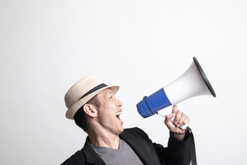 Adult Asian man  announce with megaphone.