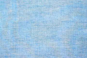 Blue color mesh fabric textured background, canvas, top view, horizontal