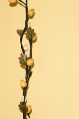 decorative artificial plant on color background