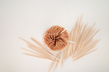 Toothpicks in a box on a white background