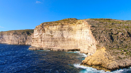 Fototapeta na wymiar The cliffs of Gozo Malta from above - aerial photography