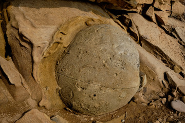 close up sandstone texture background with giant ball in the middle, natural surface. Background on theme geology