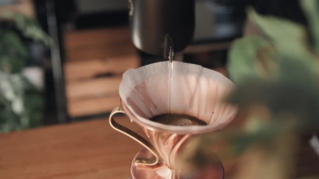 Pouring over Coffee on wooden table with V60 filter