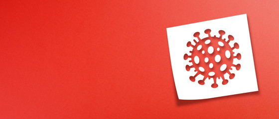 Note paper with virus icon on panoramic red background